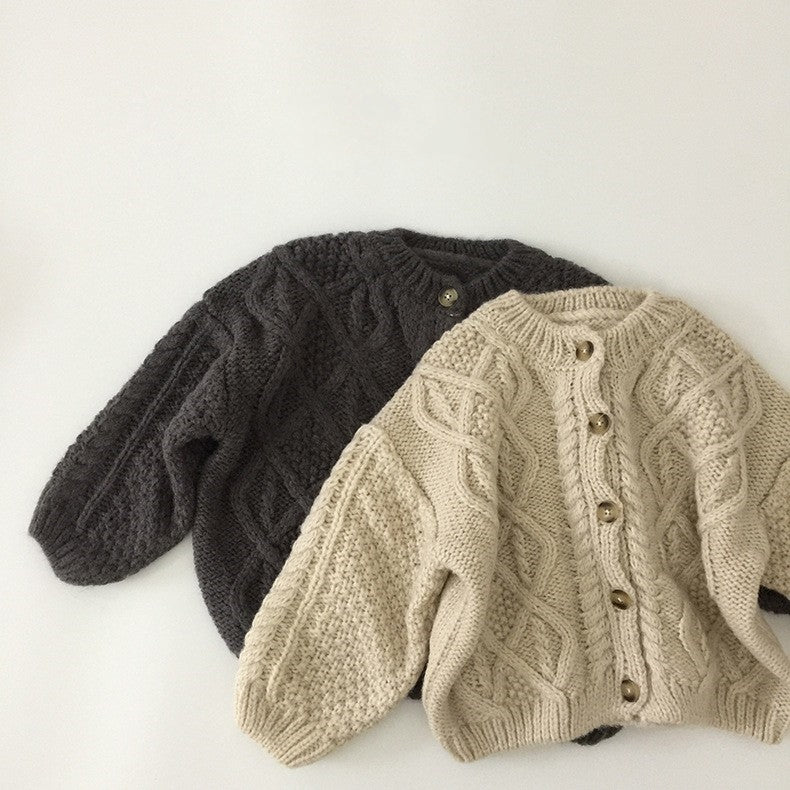 Chunky cable knit baby girl cardigan in oatmeal and charcoal fisherman style – AWA Baby Boutique