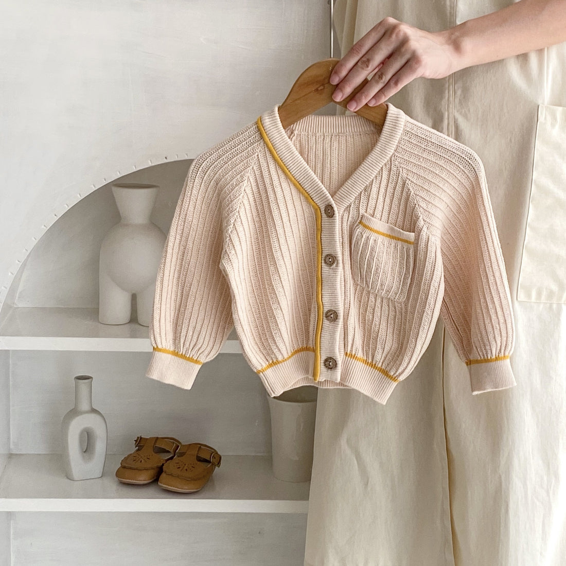 Cream varsity ribbed baby girl cardigan with mustard yellow trim and pocket – AWA Baby Boutique