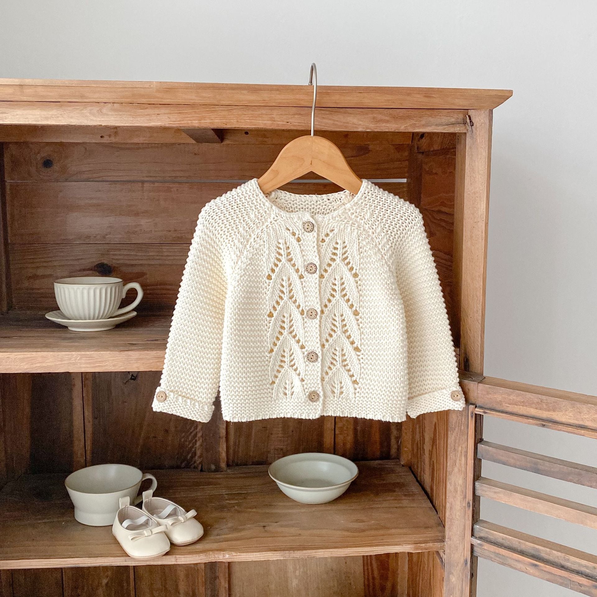 Cream heirloom knit baby girl cardigan with leaf lace detail and wooden buttons – AWA Baby